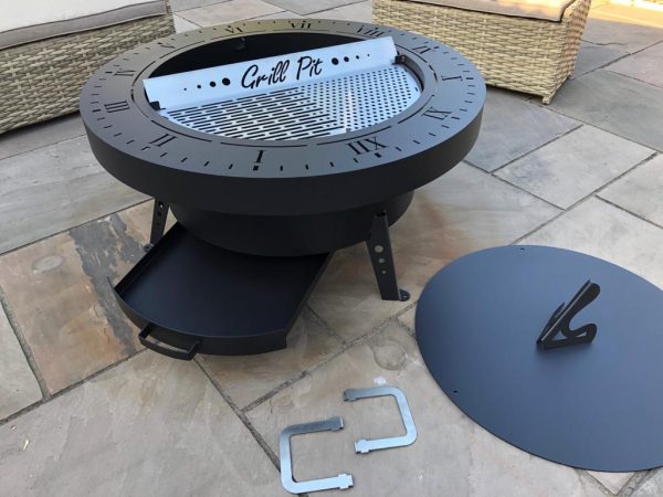 Hand fabricated Fire Pit, BBQ & Sundial with all parts laid out