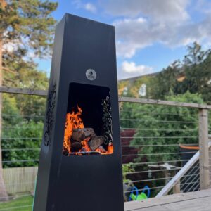 beautiful luxury chiminea with trees and viaduct in background